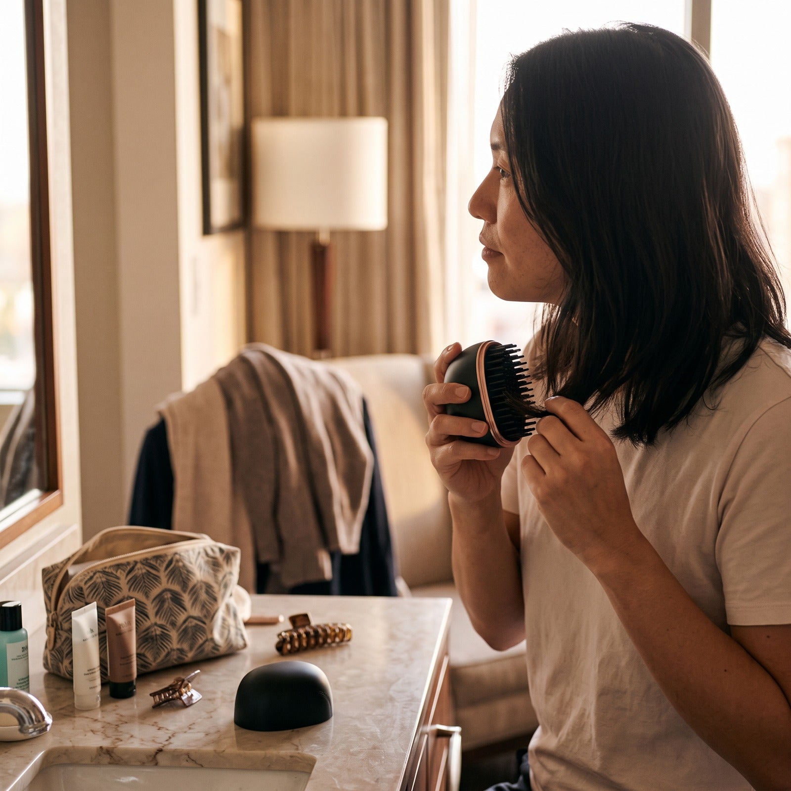 Black brush smoothing dry ends at a hotel