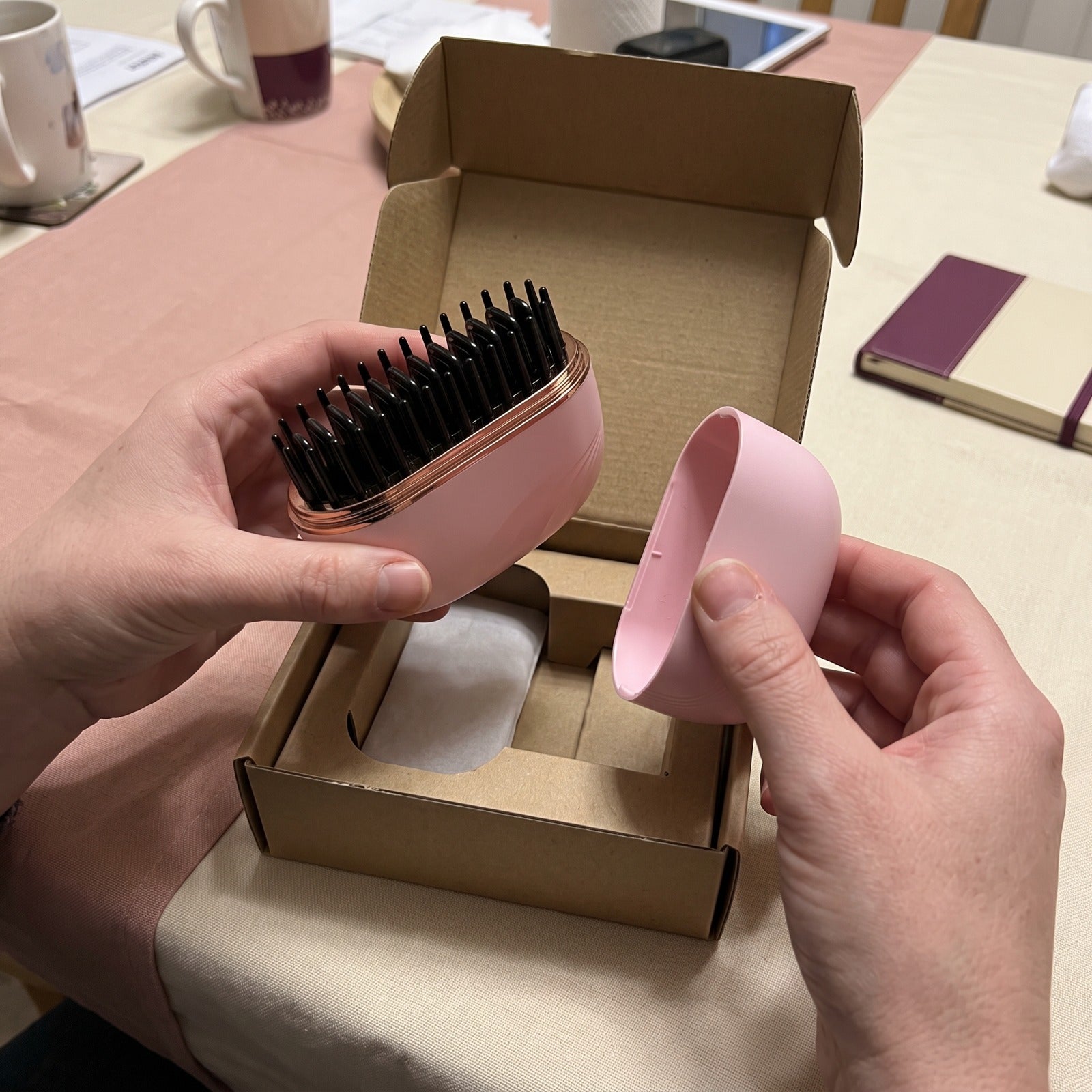 Pink brush and cap lifted from a plain box