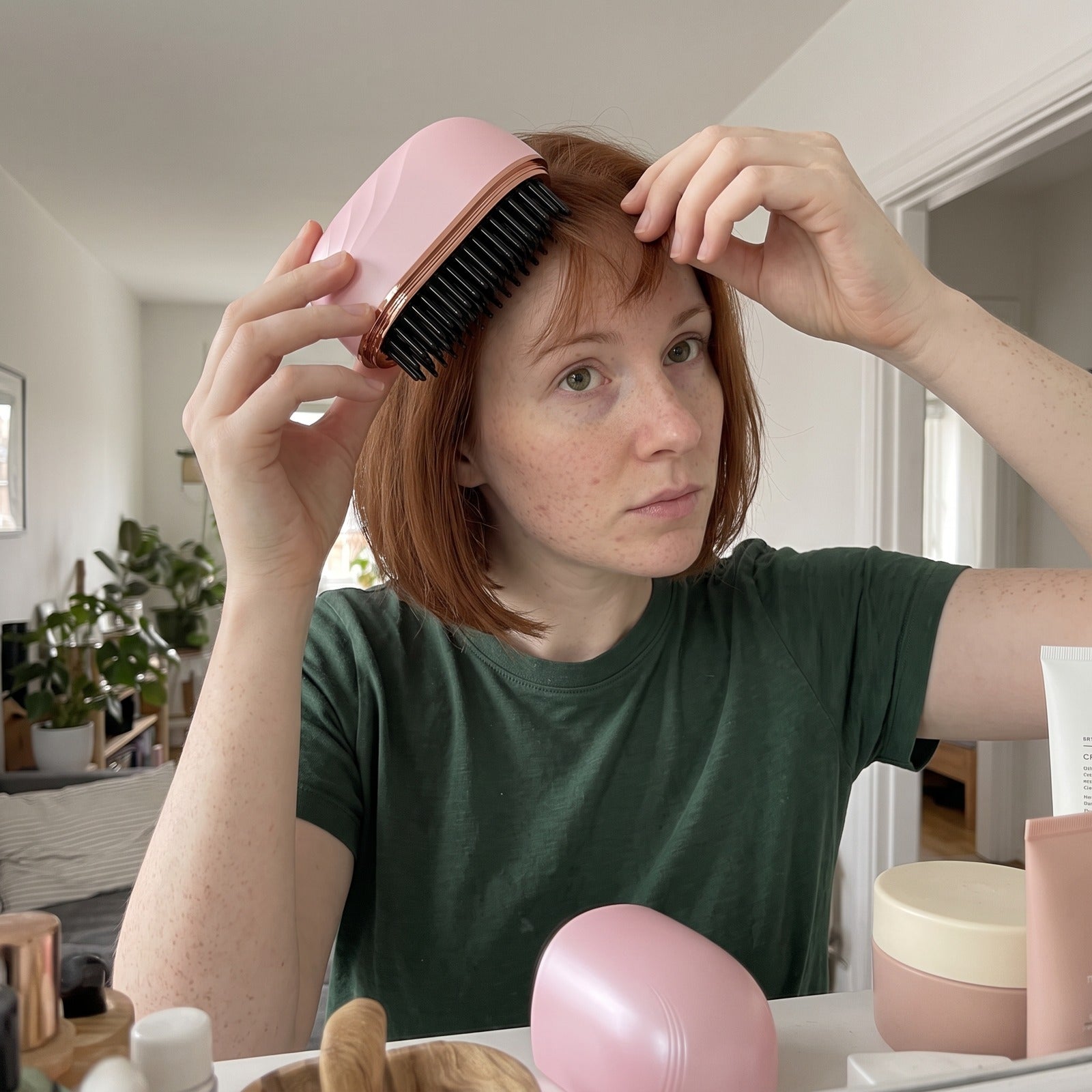 Owner touching up dry fringe and ends